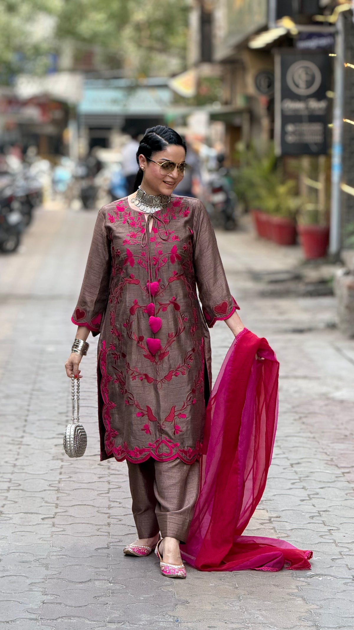 Machine embroidered suit