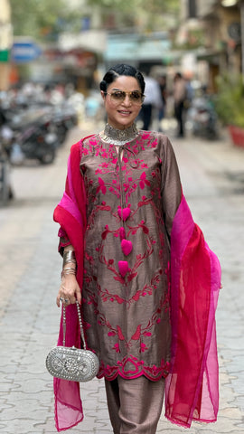 Machine embroidered suit