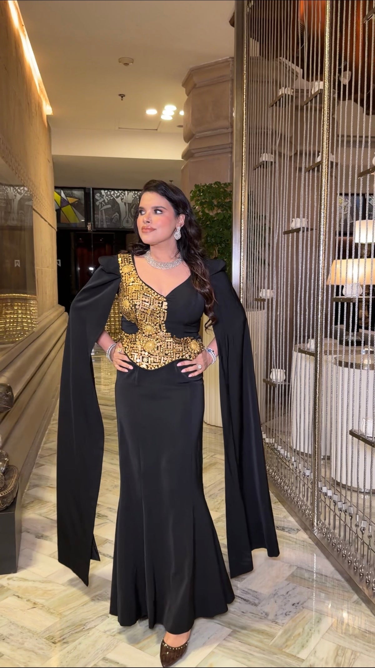 Peplum cape gown