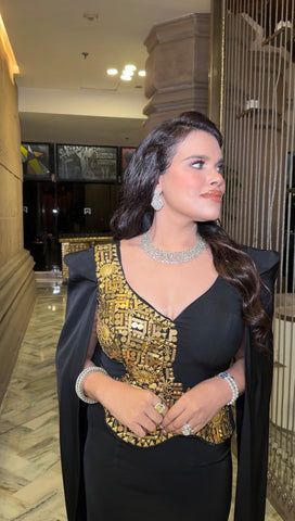 Peplum cape gown
